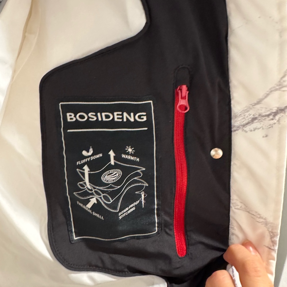 Stylish White Ski Jacket with Black Accents - Picture 7 of 9